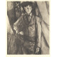 Le Garson au gilet rouge